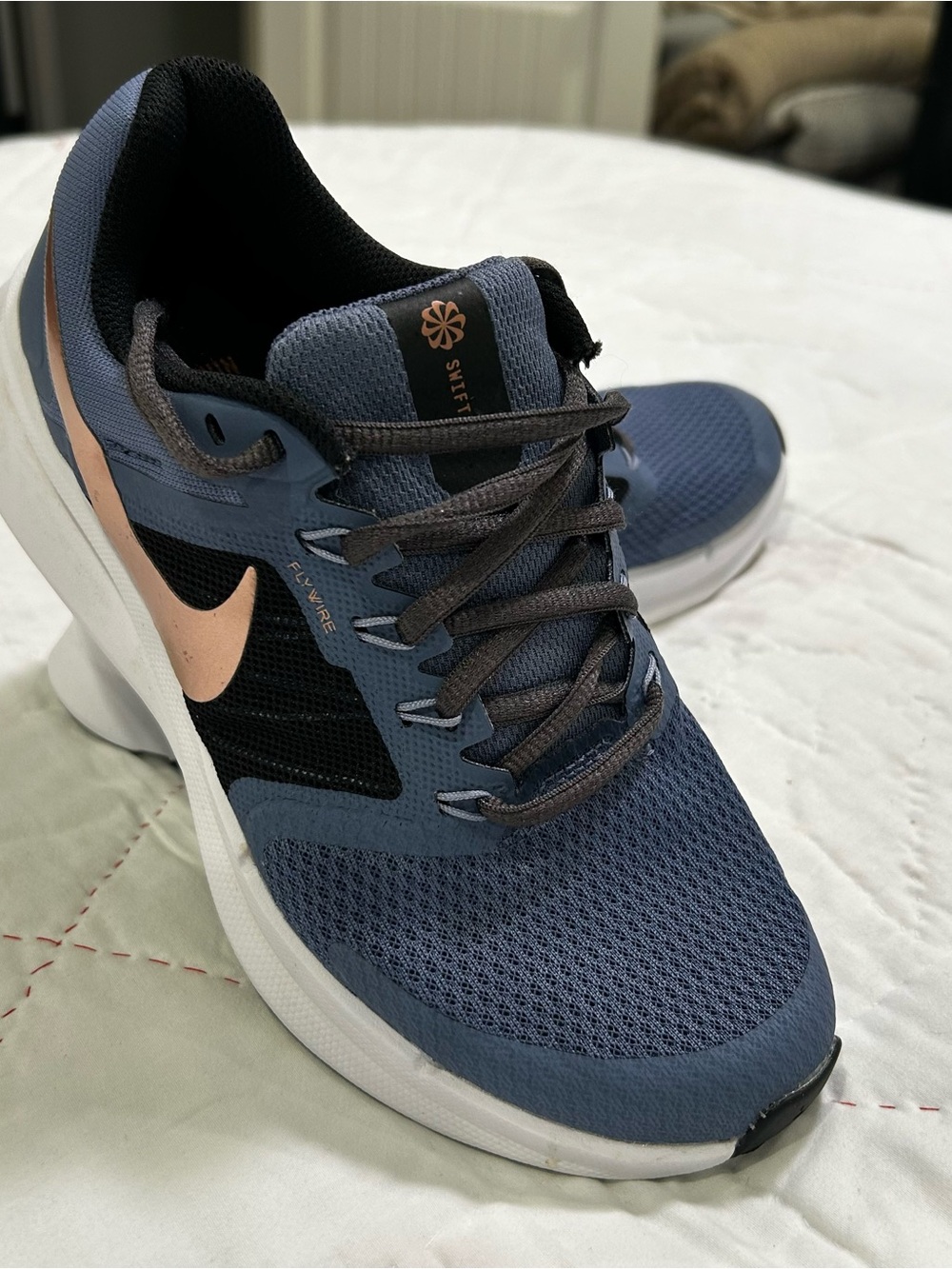 Nike Women’s Blue Athletic Sneakers with Peach Swoosh